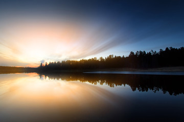 Bright sunset over the water