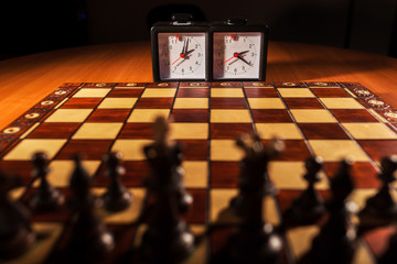chessboard, clock and figures