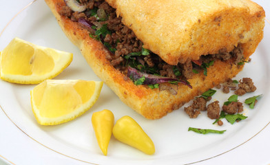 Traditional Turkish cuisine, Tantuni with loaf bread.
