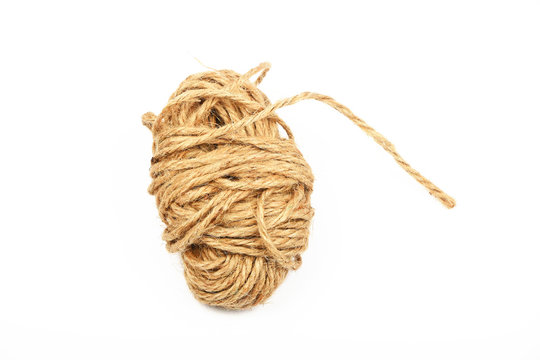 Coil bobbin of burlap jute rope over white