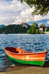 Fototapeta na wymiar Boats at the pier of Lake Bled