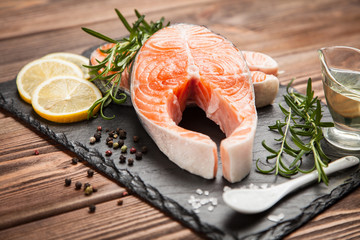 Fresh salmon on old wood