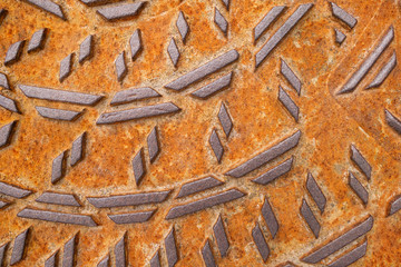 Reliefmuster von einem Gullydeckel  