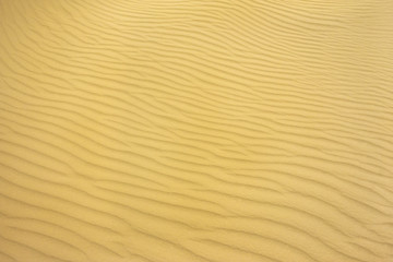 Obraz premium sand on the beach in summer. wave