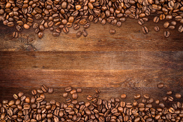 coffee background with beans on rustic old oak wood