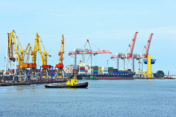 Tugboat and port cargo crane