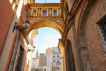 Fototapeta na wymiar Valencia Plaza Virgen square with cathedral arch
