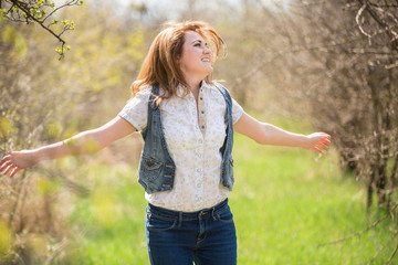 woman enjoys spring garden