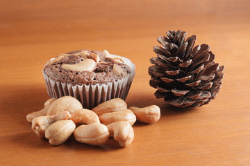 Cup of Brownies With Cashew nuts On Wooden Background