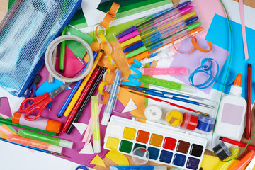 artwork workplace with creative accessories, art tools for painting and drawing