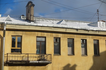 Fototapeta na wymiar Centenary typical apartment building on Vasilyevsky Island, St. Petersburg, Russia