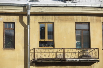 Fototapeta na wymiar Centenary typical apartment building on Vasilyevsky Island, St. Petersburg, Russia