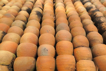 Stacks of clay flowerpots