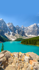 Naklejka na ściany i meble Majestic mountain lake in Canada. Moraine Lake in Alberta, Canada.