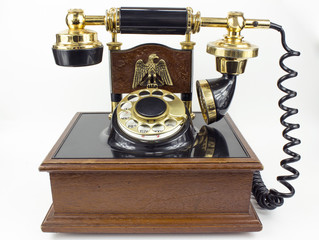 Fototapeta na wymiar Vintage Rotary Dial Telephone isolated on white