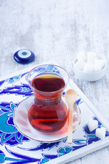 A glass of Turkish black tea