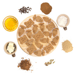 flavoured ginger snaps with ingredients on white background