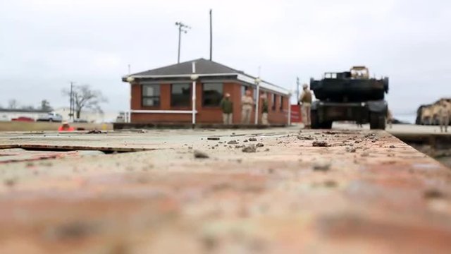 U.S. military gear is loaded on to railcars and prepared for cross country transport.