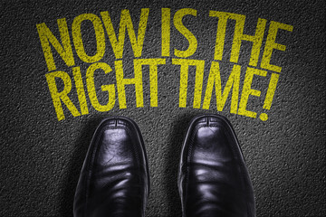 Top View of Business Shoes on the floor with the text: Now Is The Right Time