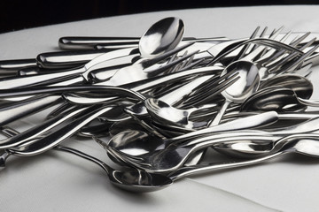 Stack of spoons and forks