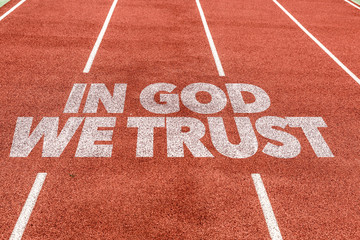 In God We Trust written on running track