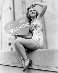 Woman holding a large valentine 