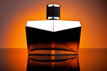 Male perfume on black background