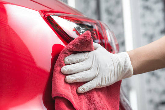 Car Polishing Series : Worker Cleaning Red Car