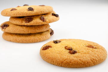 Confectionery theme. Cookies with raisins on a white background. Closeup