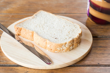 Whole grain bread on wooden plate