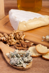 Dor blue and white cheese with nuts and honey