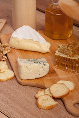 Dor blue and white cheese with nuts and honey