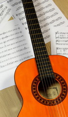 Fototapeta na wymiar classical guitar with music score