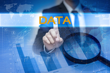 Businessman hand touching DATA button on virtual screen
