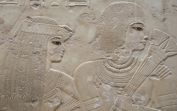 Ancient Egyptian engraving of a young couple