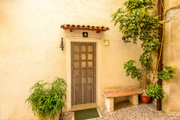 Entrance of an apartment building in Limone, Garda, Italy.