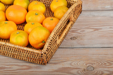 Mandarin on wickered tray