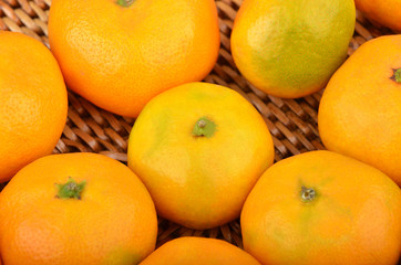 Mandarin on wickered background