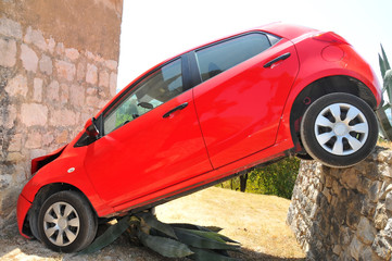 Car driven off the edge of a car park