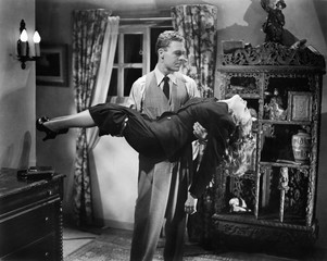 Man carrying a woman who fainted 
