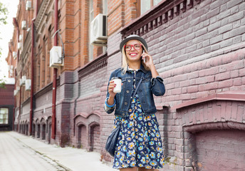 Young woman walking down the street