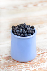 Blueberry on wooden background
