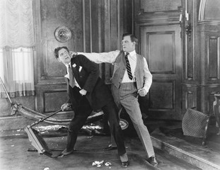 Two men fighting and arguing with each other 