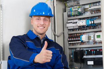 Portrait Of A Happy Young Male Electrician