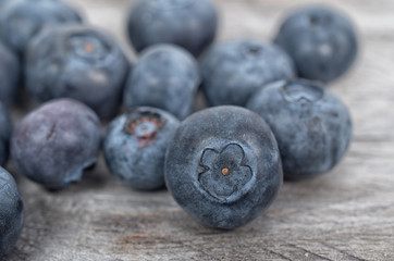 Blueberries on wooden table, selective focus