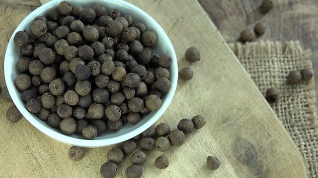 Some fresh made Allspice (rotating 4K footage; seamless loopable)
