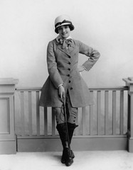 Portrait of female rider with riding crop 