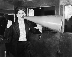 Man with huge megaphone 