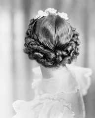 Naklejka premium Closeup of curls on back of womans head 