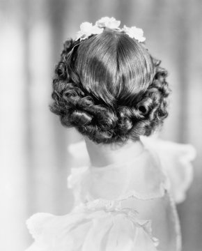 Closeup of curls on back of womans head 